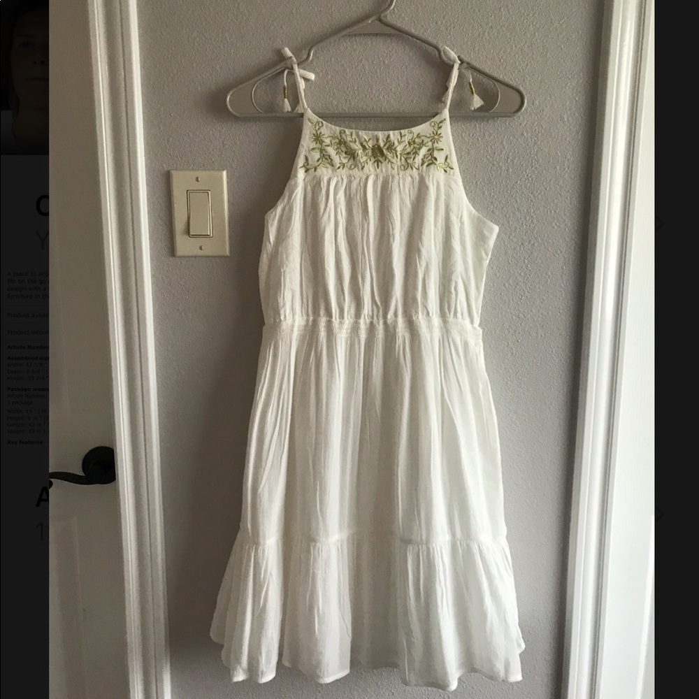 White dress with gold floral embroidery